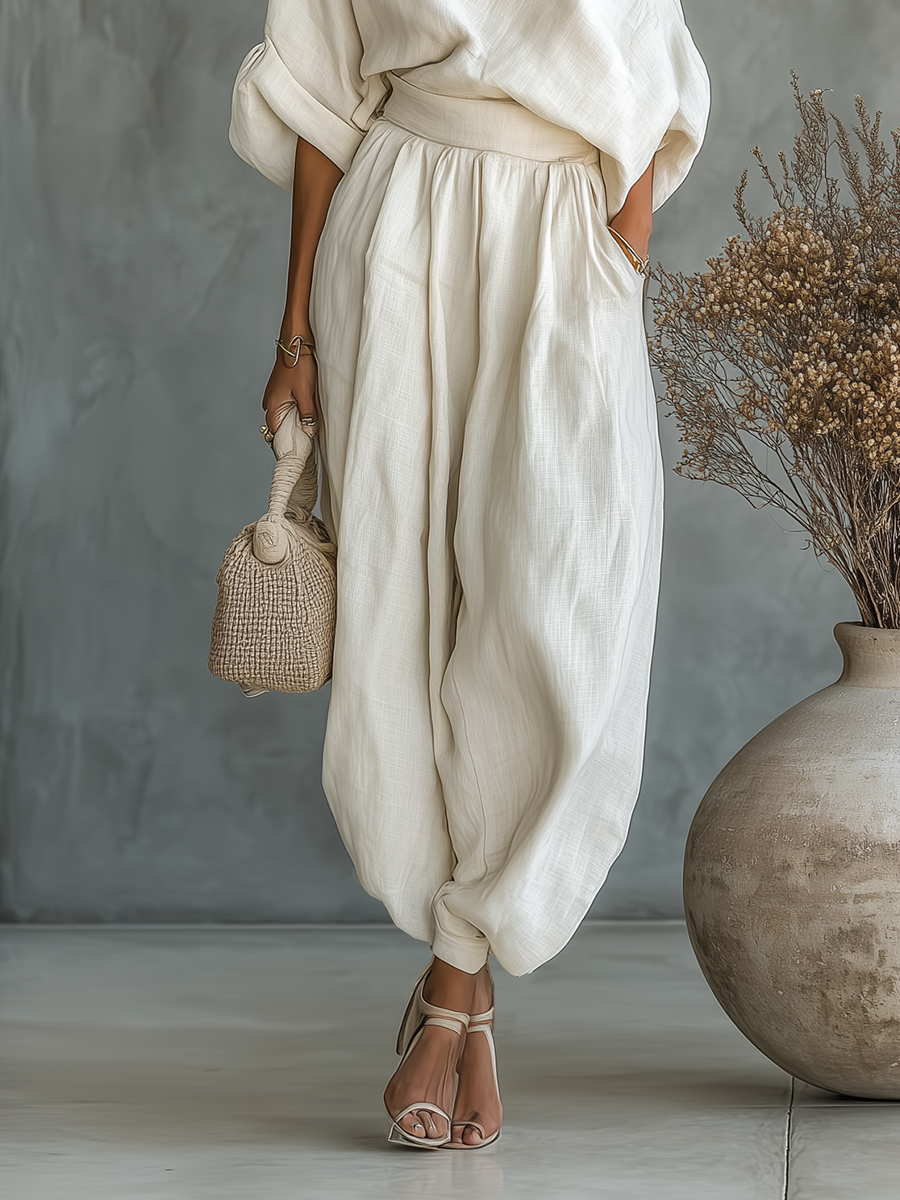 Conjunto de top holgado con hombros descubiertos y pantalón cónico de lino blanco roto para mujer MDA2770K8T